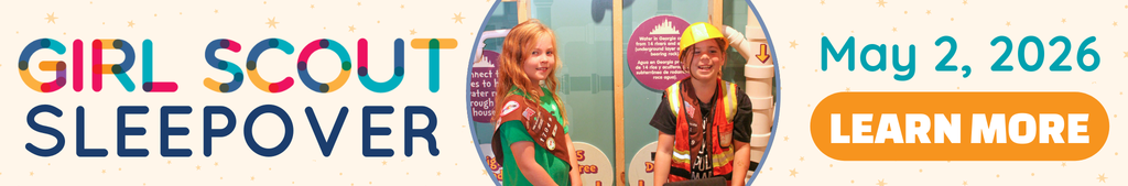text: girl scout sleepover may 2, 2026 learn more picture of two girl scouts wearing their vest and badges while playing in the construction house