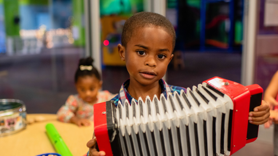 Child playing the accordion